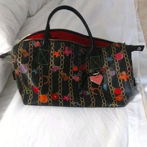 Very rare Dooney& Boxke speedy duffel charm bag